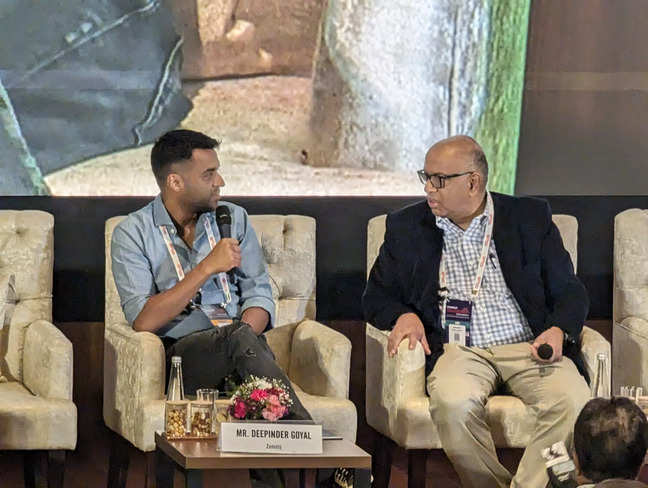 Zomato cofounder and chief executive Deepinder Goyal with Info Edge cofounder Sanjeev Bikhchandani