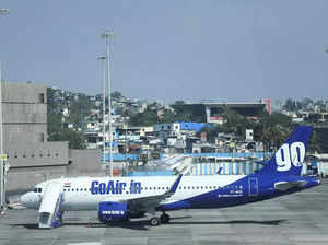 FILE PHOTO_ A Go First airline, formerly known as GoAir, passenger aircraft is parked at the Chhatrapati Shivaji International Airport in Mumbai,.