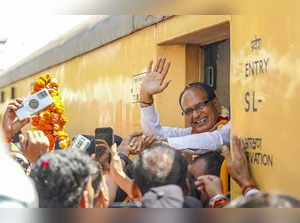 Bhopal: Former Madhya Pradesh CM and BJP candidate Shivraj Singh Chouhan waves a...