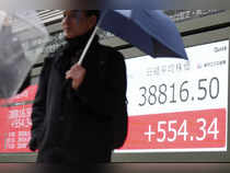 Japan's Nikkei hits record high on Wall Street gains, weaker yen