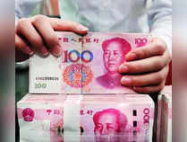 China's yuan slides to 4-month low, state banks step in