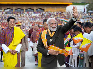 **EDS: IMAGE VIA PMO** Thimphu: Prime Minister Narendra Modi with Bhutan’s King ...
