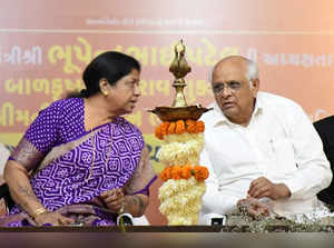 Vadodara: Gujarat Chief Minister Bhupendra Patel interacts with BJP MP Ranjan Bh...