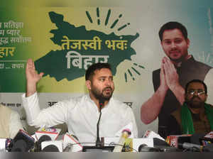 Patna: RJD leader Tejaswi Yadav addresses a press conference, at the party offic...