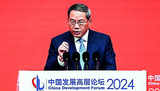 Chinese premier downplays risks to economy, highlights policy space