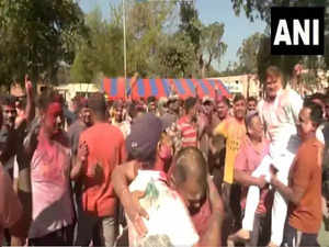BSF personnel celebrate Holi at Khasa headquarters in Amritsar