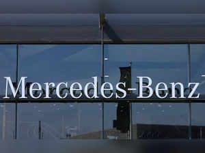 FILE PHOTO: The logo of Mercedes-Benz is seen outside a Mercedes-Benz car dealer in Brussels