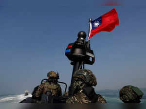 Members of Taiwan's Navy in a drill part of a demonstration for the media at a navy base in Kaohsiung