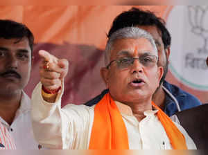 Kolkata: BJP MP Dilip Ghosh with others speaks during a sit-in 'dharna' against ...