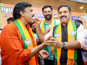 Bengaluru, Mar 25 (ANI): Karnataka BJP President BY Vijayendra offers sweets to ...