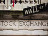 US stocks gain, led by Dow as investors look for rate insight