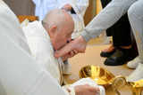Pope Francis washes and kisses feet of 12 women prisoners in per-Easter ritual during a Holy Thursday ceremony