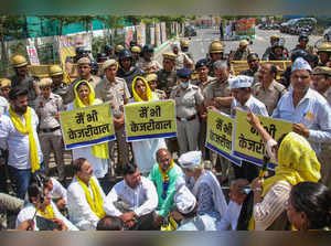 Gurugram: Aam Aadmi Party (AAP) workers stage a protest against the arrest of De...