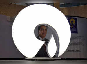 FILE PHOTO: The logo of Reliance Industries is pictured in a stall at the Vibrant Gujarat Global Trade Show at Gandhinagar