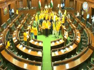 AAP MLAs don 'Mai Bhi Kejriwal' yellow T shirts in Delhi Assembly as they protest Chief Minister's arrest
