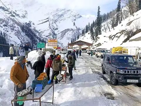Tourists throng hills
