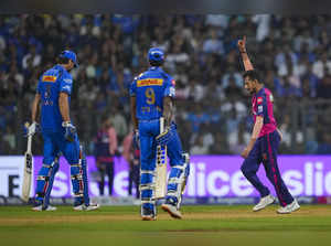 Mumbai: Rajasthan Royals bowler Yuzvendra Chahal celebrates the wicket of Mumbai...