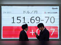 Asian shares up, dollar firms as rate cut wagers fade