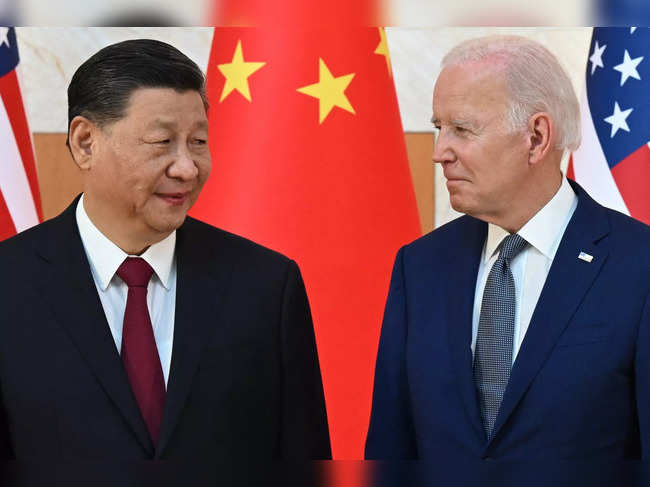 US President Joe Biden (R) and China's President Xi Jinping (L) meet on the sidelines of the G20 Summit in Nusa Dua on the Indonesian resort island of Bali on November 14, 2022.