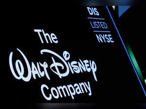 FILE PHOTO: A screen shows the trading info for Walt Disney Company company on the floor of the NYSE in New York