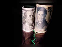 File photo of Japanese yen and US dollar banknotes