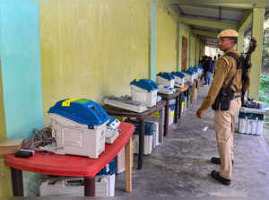 Sonitpur: Security personnel stand guard during the display of Electronic Voting...