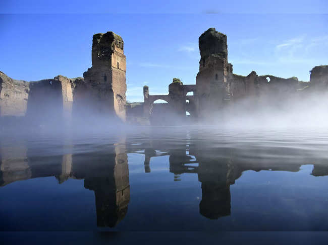 A view of the new water feature installed at the Baths of Caracalla (Terme di Caracalla) which reflects the ancient Roman ruins like a mirror, in Rome on April 4, 2024.