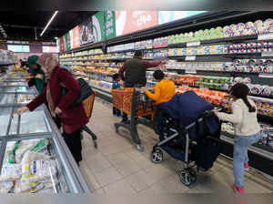 Libyans shop at a supermarket in Tripoli on February 24, 2024.