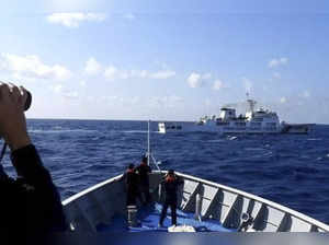 Chinese coast guard ships attempt to block Philippine vessels carrying scientists in South China Sea