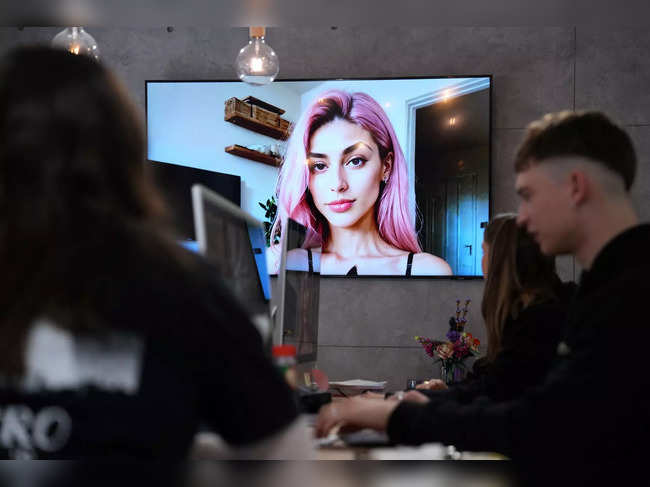 This photograph taken on March 25, 2024, shows an artificial intelligence generated image of Aitana Lopez model displayed in a screen at the headquarters of The Clueless company in Barcelona.