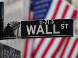 Wall Street ends flat as investors await CPI, earnings