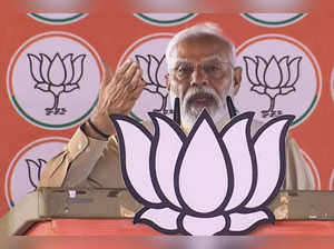 **EDS: GRAB VIA @BJP4UP** Pilibhit: Prime Minister Narendra Modi addresses a pub...