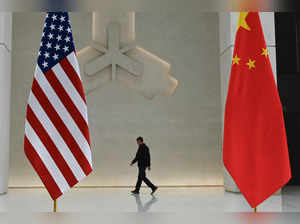 The US and China flags are seen at the People's Bank of China prior to the arrival of US Treasury Secretary Janet Yellen to the central bank's headquarters in Beijing on April 8, 2024.