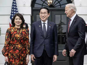 US President Joe Biden welcomes Japan's Prime Minister Fumio Kishida and his spouse Yuko Kishida at the South Portico of the White House in Washington, DC, on April 9, 2024.
