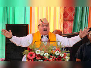 Dehradun: BJP National President JP Nadda addresses during a public meeting ahea...