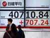 Japan's Nikkei falls as bond yield spike sinks tech, property shares