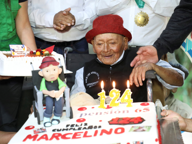 Peruvian Marcelino 'Mashico' Abad smiles while celebrating his 124th birthday, as local authorities claim he might be the world's oldest ever person, in Huanuco, Peru.