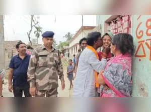 Controversy erupts as BJP's Khagen Murmu kisses woman during West Bengal campaign