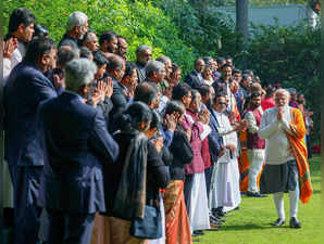 New Delhi, Dec 25 (ANI): Prime Minister Narendra Modi exchanges greetings with m...