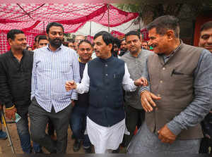 Jammu: BJP National Spokesperson Syed Shahnawaz Hussain with party workers durin...