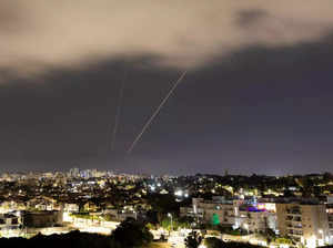 An anti-missile system operates after Iran launched drones and missiles towards Israel, as seen from Ashkelon.