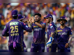 Kolkata Knight Riders' Vaibhav Arora (C) celebrates with teammates after taking the wicket of Lucknow Super Giants' Quinton de Kock during the Indian Premier League (IPL) Twenty20 cricket match between Kolkata Knight Riders and Lucknow Super Giants at the Eden Gardens in Kolkata on April 14, 2024.