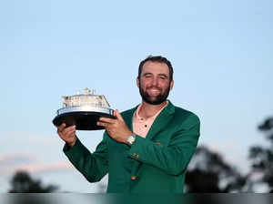 Scottie Scheffler of the United States poses with the Masters trophy after winning the 2024 Masters Tournament at Augusta National Golf Club on April 14, 2024 in Augusta, Georgia.