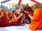 Dalai Lama greets other monks at an all faith prayer meeting