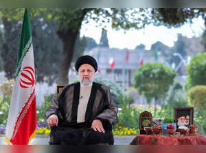 This handout picture provided by the Iranian presidency shows Iran's President Ebrahim Raisi shows him addressing and giving the annual address to the nation for Nowruz, the Persian New Year, in Tehran on March 20, 2024.