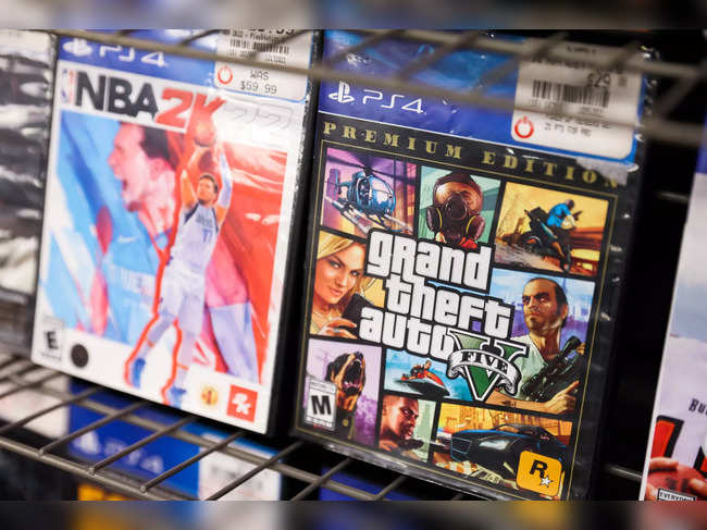 FILE PHOTO: NBA 2K22 and Grand Theft Auto 5 by Take-Two Interactive Software Inc are seen for sale in a store in Manhattan, New York City