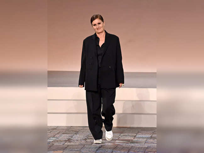 Italian fashion designer Maria Grazia Chiuri walks the runway at the end of the Dior Fall/Winter 2024 fashion show at the Brooklyn Museum in Brooklyn, New York on April 15, 2024.