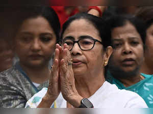 Mamata Banerjee (foreground C), Chief Minister of India's West Bengal state and Trinamool Congress (TC) party leader, gestures while leading party members during a rally march on the occasion of the upcoming International Women's Day in Kolkata on March 7, 2024.