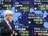 Asian shares gain on central banks liquidity move