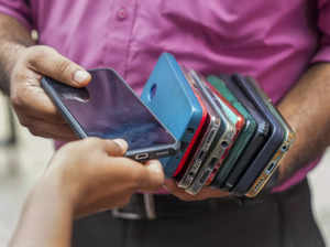 Mumbai: Students deposit their mobile phones before entering an examination cent...